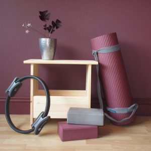 Image of Pilates mat, blocks, and isotoner